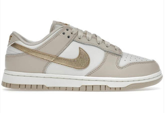 Nike Dunk Low Phantom
Metallic Gold